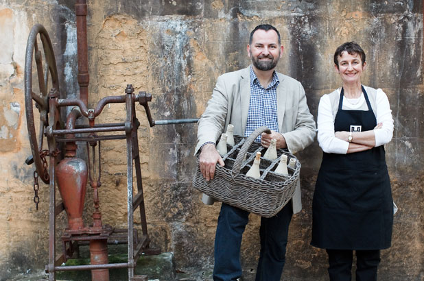 The Cook and the Curator standing by the well at Vaucluse House.