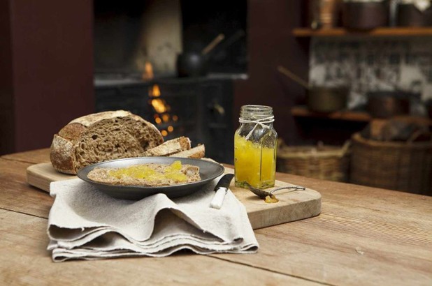 Jam and rustic bread on the kitchen table at Vaucluse House.