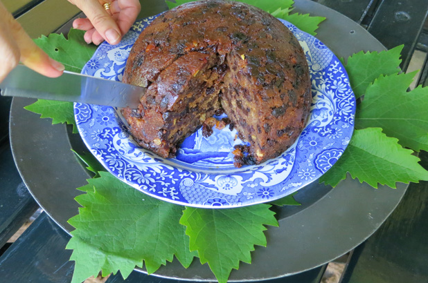 Half eaten Christmas plum pudding.