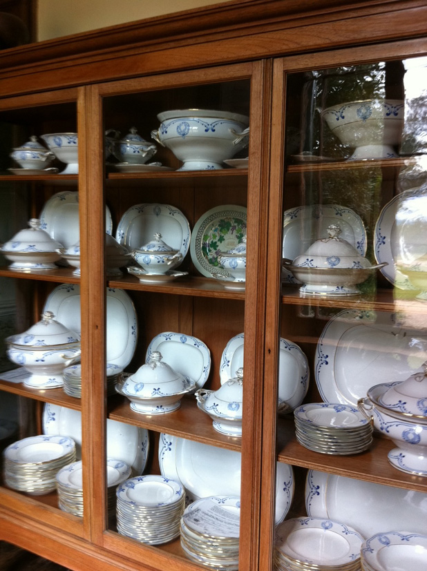 The Macarthur dining settings on display in the 'china passage' at Camden Park. 