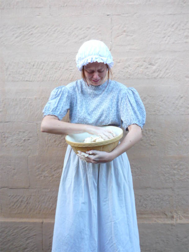 Weeping Anna making bread.