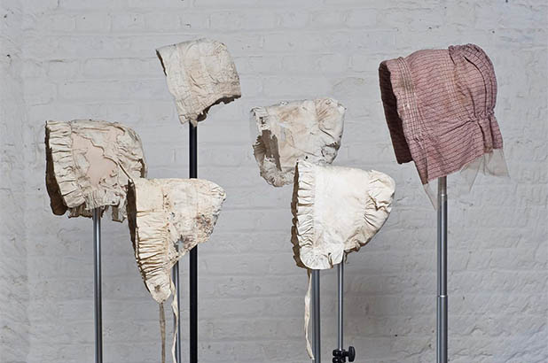 A range of different bonnets worn by the females living at Hyde Park Barracks.