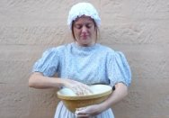 'Scullery maid' Anna making bread.