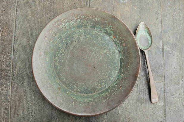 An empty plate and spoon, part of the Irish Famine Memorial.