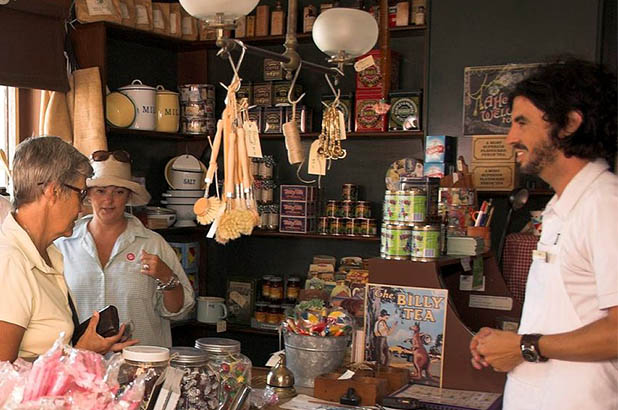 Customers inside the Susannah Place corner shop.