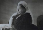 A black and white photograph of Queen Victoria.