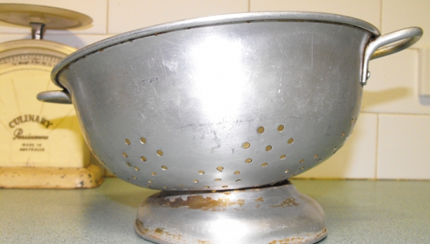 Photograph of a broken collander