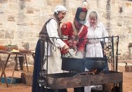 Cooking over the fire at 'Redcoats and Convicts' at the Hyde Park Barracks.