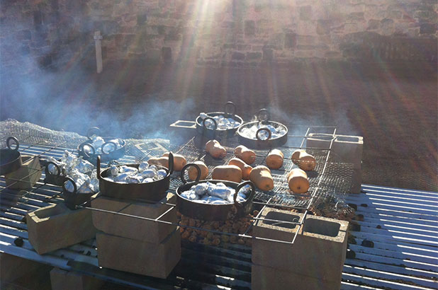 Food cooking on the barbeque.