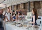 Fiona Starr, with visitors enjoying the displays at the Mint on Australia Day.