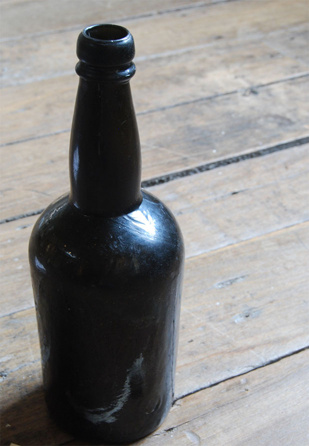 Early nineteenth century rum or alcohol bottle.