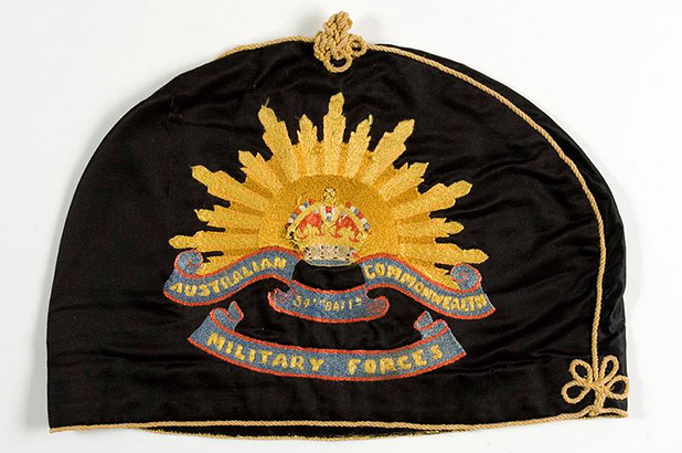 Tea cosy embroidered with the Rising Sun badge, from Rouse Hill House and Farm.