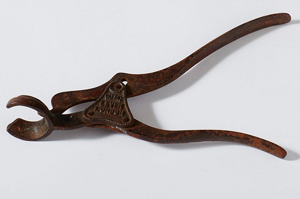 Bottle opener by Lund, mid 19th century.