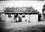 Children in front of whitewashed house with bark roof Hill End, American & Australasian Photographic Company, 1870-1875