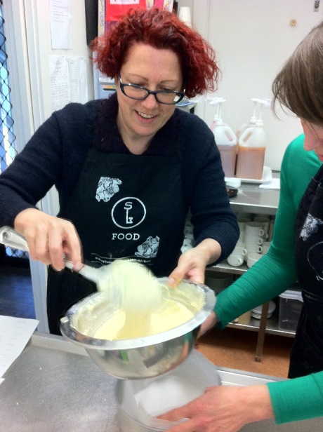 Margot and Charmaine making sponge cake