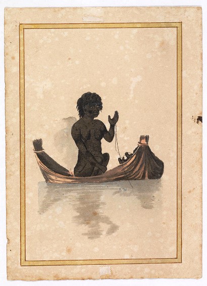 Aboriginal woman in canoe fishing with a line