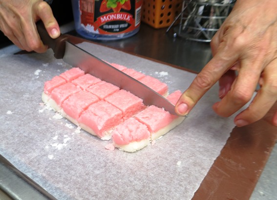 Cutting the cocoanut ice