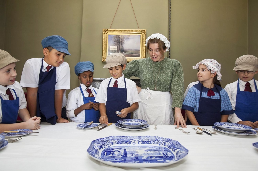 Children learning Victorian "Table language" at Elizabeth Farm. 